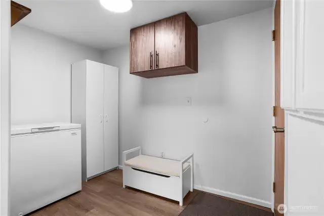 Utility room off the garage, comes with chest freezer!