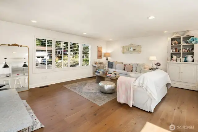 open room concept // living room with white shutters