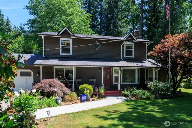 Charming front porch greets you.