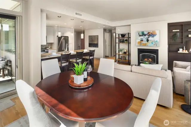 Looking from the south east corner of the room towards the living room and kitchen areas.