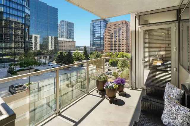 The balcony can be accessed from the dining room as well as the Primary Bedroom. This view is looking west.