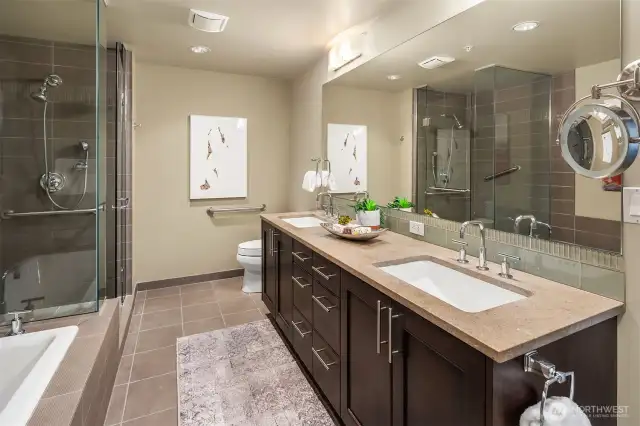 The Primary Bathroom complete with double sinks, Shower and Tub.