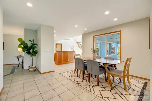 Dining Area with Tile Flooring and Natural Light