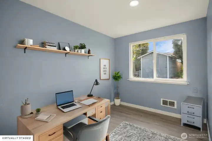 Versatile bedroom ideal for guest space, home office, or nursery.