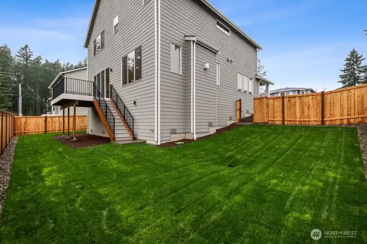 Large, usable yard space-fully landscaped and fenced.