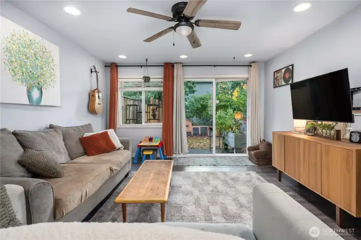 Unit 2 Living Room: Bright, open layout  Inviting living area with recessed lighting, durable flooring, and seamless flow into the kitchen—perfect for everyday living or rental appeal.