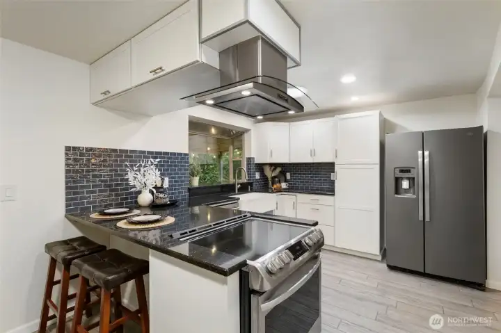 Kitchen with bar for seating