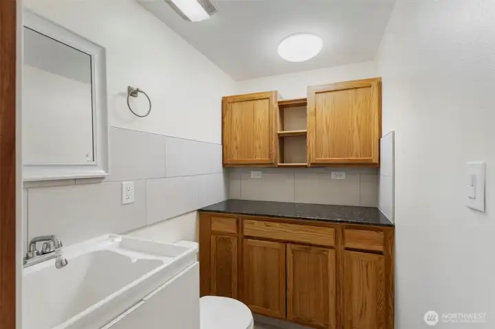 1/2 bath with storage on lower level