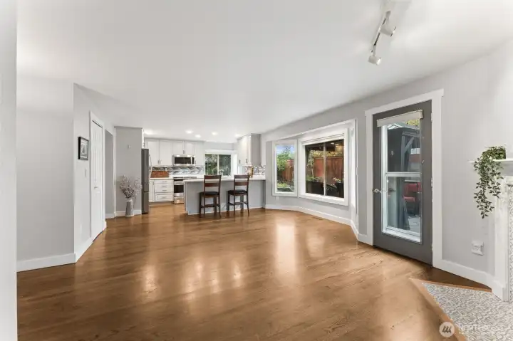 View from edge of family room to your kitchen, walk-in pantry on your left.