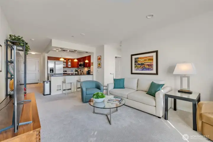 The open 2-bedroom + den, 1.75-bath layout feels both spacious and functional, offering excellent bedroom separation.