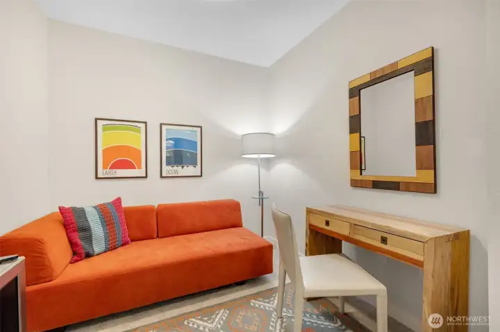 The den offers flexible space for a home office or overflow sleeping.