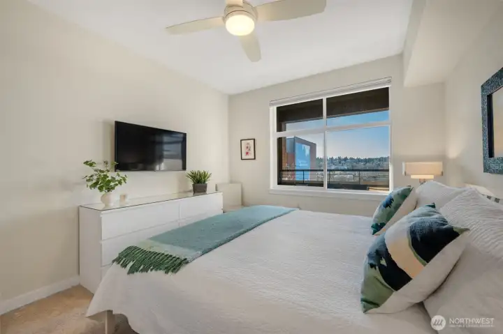 South-facing windows flood the home with natural light and capture beautiful canal and Olympic Mountain views from every room.