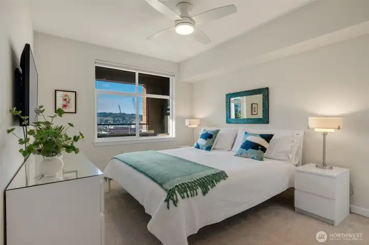 The primary bedroom comfortably accommodates a king bed and includes a walk-in closet and an ensuite ¾ bath.