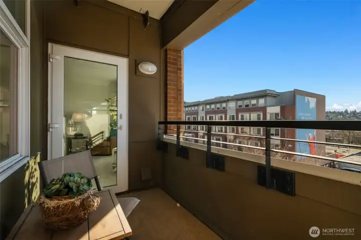 A private deck off the living room provides the perfect spot to unwind and take in the views.