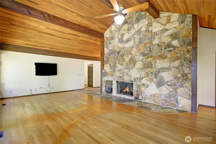 Tongue and groove ceiling plus grand fireplace.