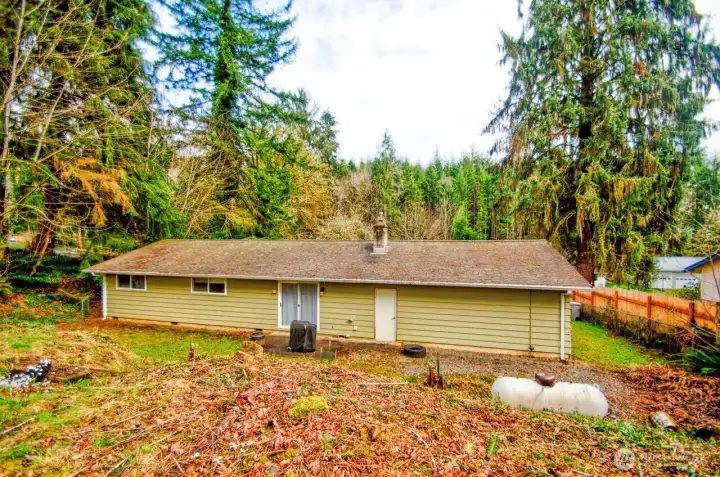 This view shows you how much room there is in the back yard. Plenty of room for a garden, shed or a shop