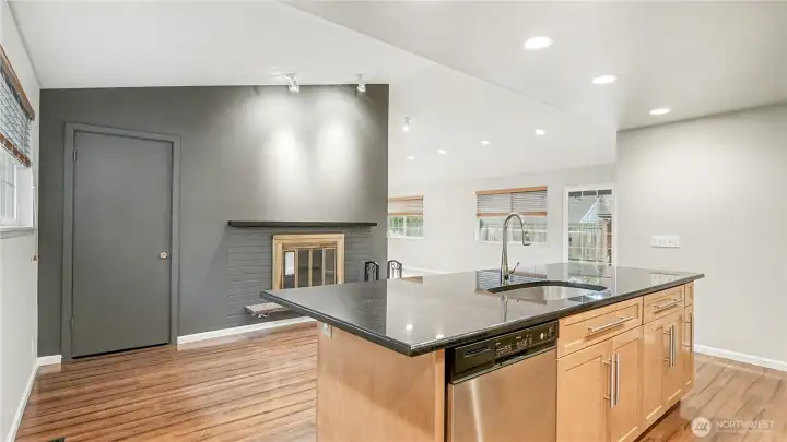Another view of this warm and inviting kitchen showcases the flow of the home.