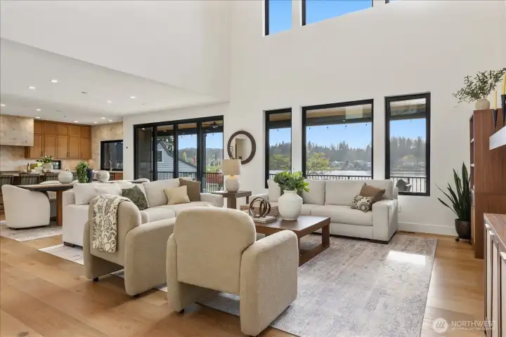 Open great room with views out to the lake.