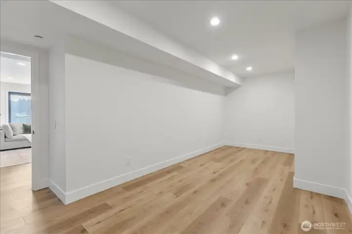 Lower level flex room - theater, yoga studio, workout room, craft room