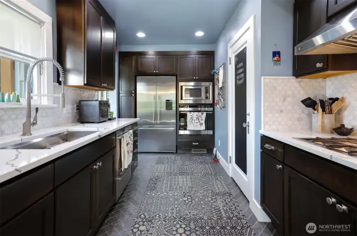 The kitchen is upgraded to perfection. (IMO)