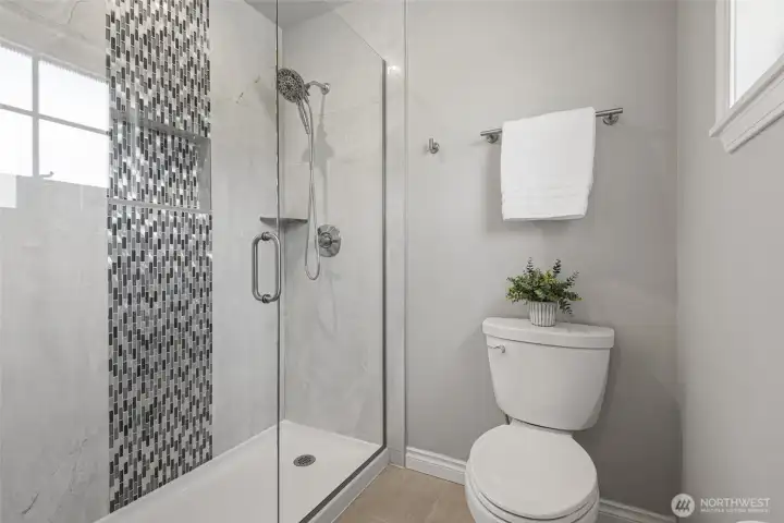 Check out the title work in this step-in shower!