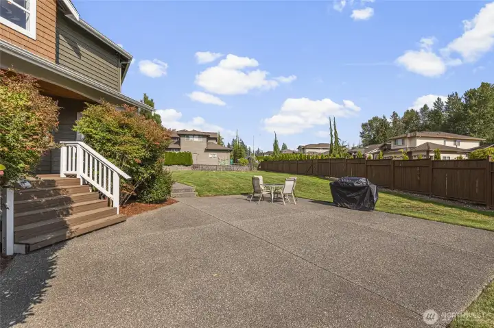 Expansive patio and outdoor living spaces offer the perfect backdrop for entertaining, relaxing, and enjoying the home’s rare private acreage setting.