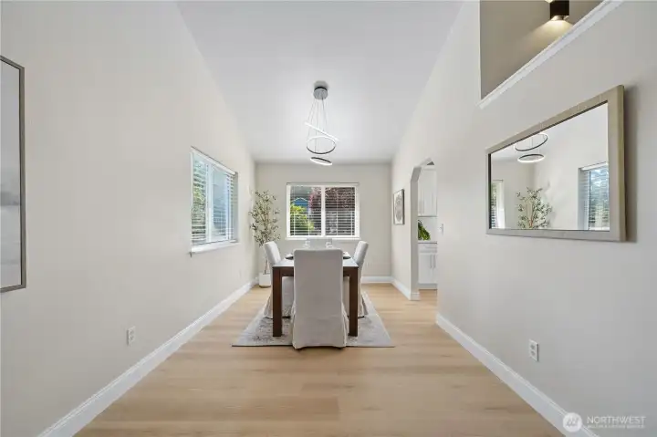 The living room flows seamlessly into the spacious dining room.
