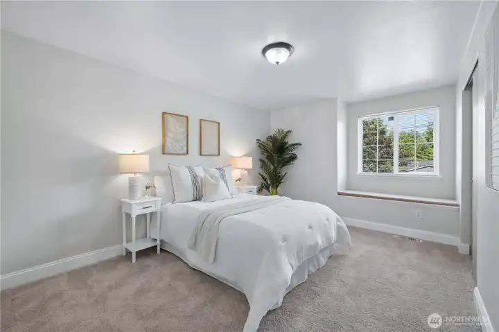 The oversized third bedroom offers another window seat, abundant natural light and a large closet.