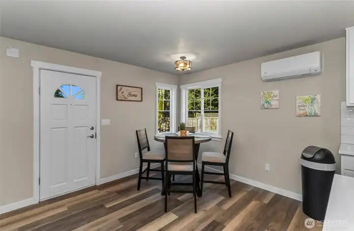 Dining room with great windows~ New LVP~ New mini split~
