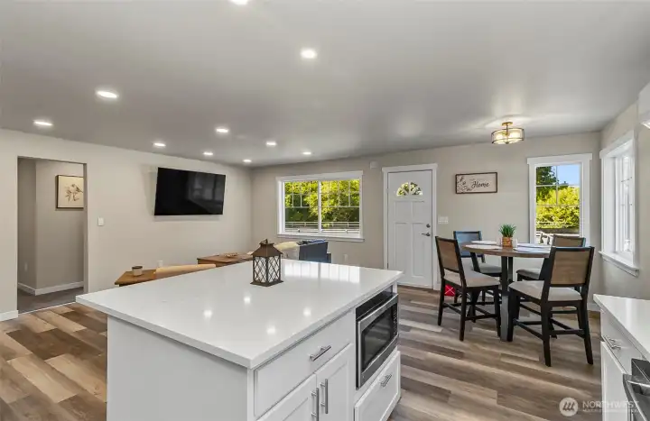 Go from the stove to the island to the dining space without walls to block you~