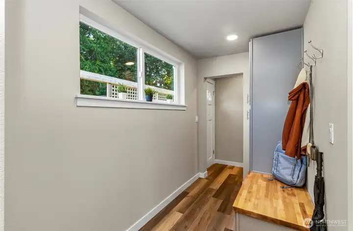 Walkway from back door to storage area~ new flooring, paint, lights~ Fantastic space