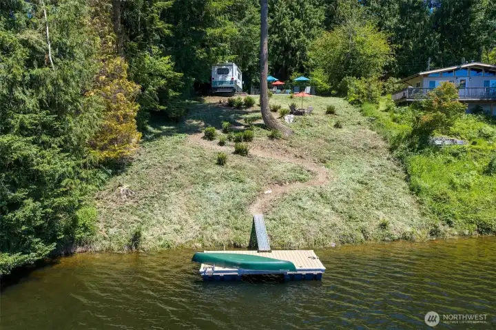 Nice building lot on Lake Margaret that is ready to enjoy for the summer while you plan for a dream home on this site. Water and electricity has been installed and ready for an RV hookup.