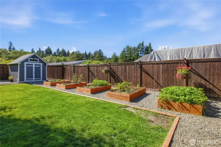 Plenty of garden space with raised beds.