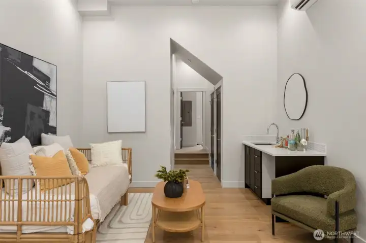 Flexibility at its finest: work from home, open up a boutique storefront, or simply enjoy a spacious, sun-drenched second living room that connects you directly to the neighborhood energy.(photos are of model home, similar finishes and floorplan)