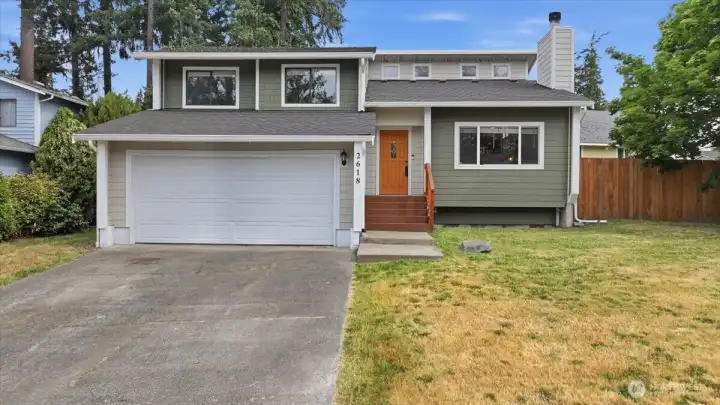 Beautiful home with new siding, roof, and paint.