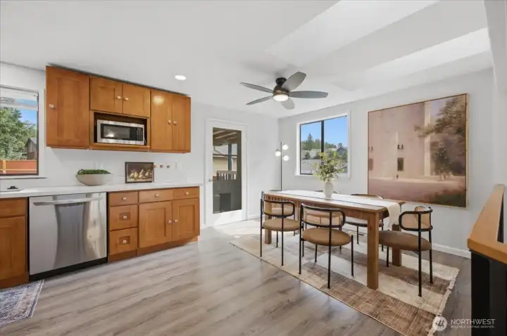 Spacious kitchen with skylights and overlooking the back yard.
