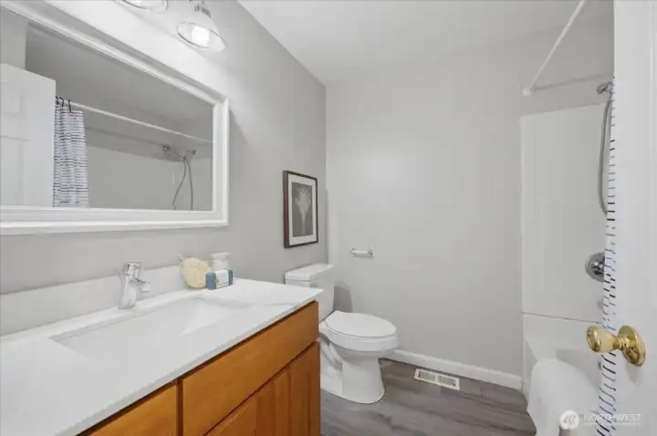 Main bath upstairs with tub