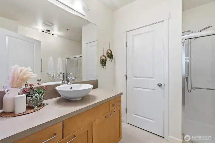 Large bathroom with closet.