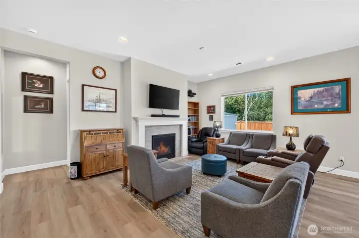 Living Room with gas fireplace. Both Living and Dining Rooms have electronic blinds. Nice touch! Living Room with gas fireplace. Both Living and Dining Rooms have electronic blinds. Nice touch!