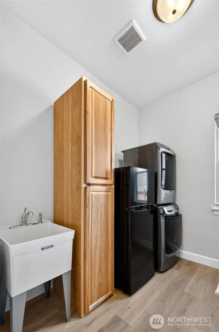 Laundry Room is ample size and includes it's own sink. Additional refrigerator is great to have! Laundry Room is ample size and includes it's own sink. Additional refrigerator is great to have!