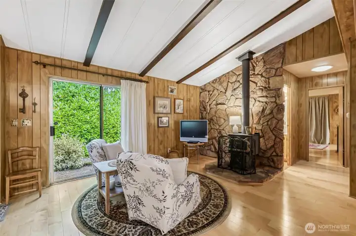 Stone wall highlights the cozy wood stove! Stone wall highlights the cozy wood stove!
