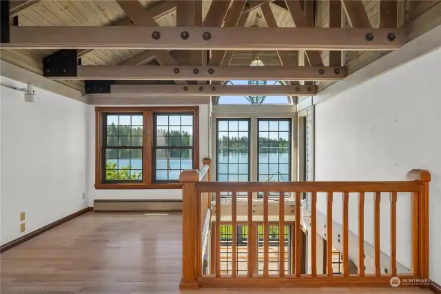 The loft is gorgeous with vaulted ceilings and huge views! Imagine working from home here or just hanging out!