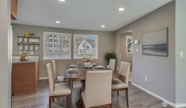 Plenty of space for everyone in this dining room, virtually staged.