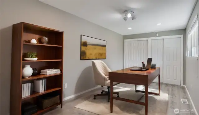 This showcases the guest rooms for business use offering the perfect space for a private office, virtually staged.