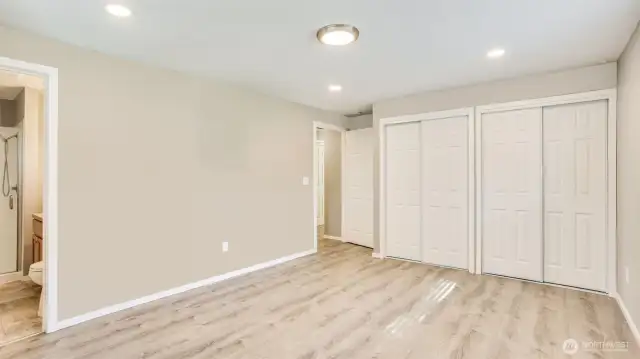 Huge primary bedroom with en suite bathroom.