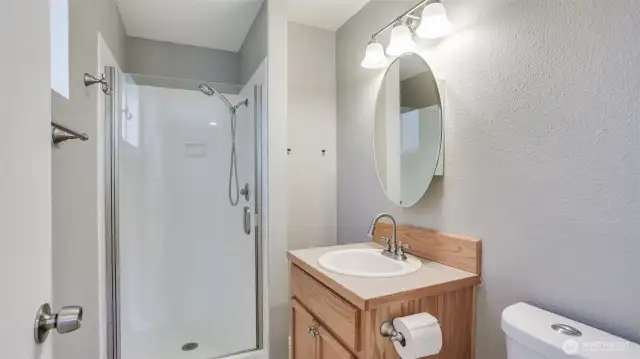 Enjoy a 3/4 bathroom in this home, located just off the primary bedroom or great as main office with private bathroom.