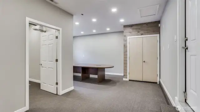 Possibilities are endless in this carpeted flex space!