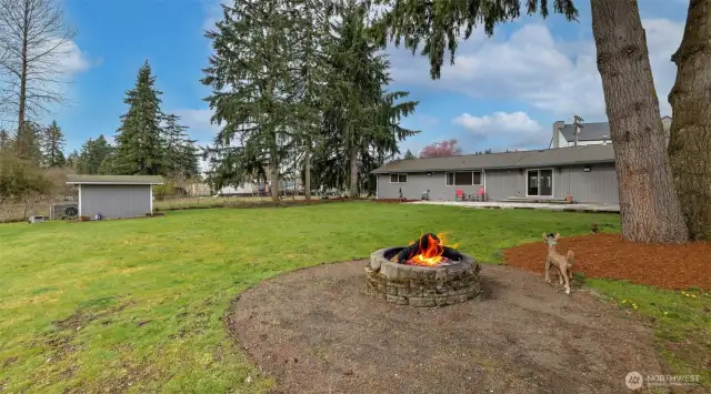 Gather around the fire pit listening to the creek in the distance.