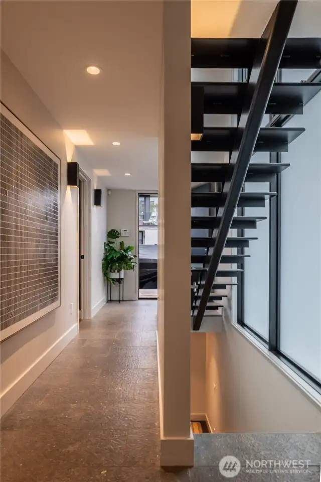 Floating staircase and radiant heated hallways