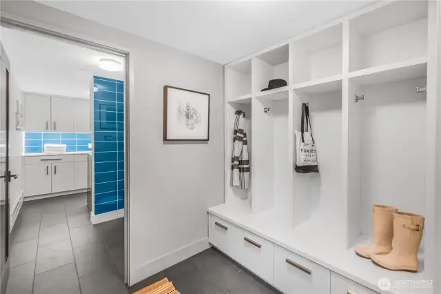 At the base of the basement stairs, there is a great storage space for whatever you need.